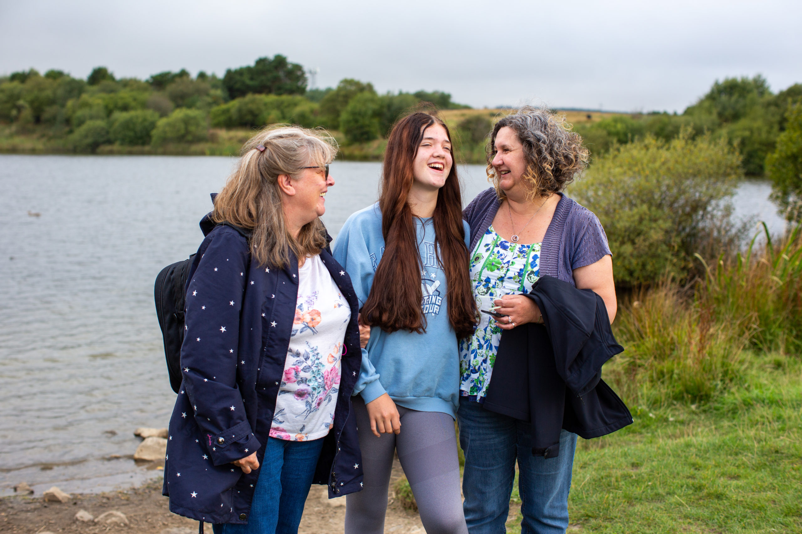 Female foster carers with teenager girl