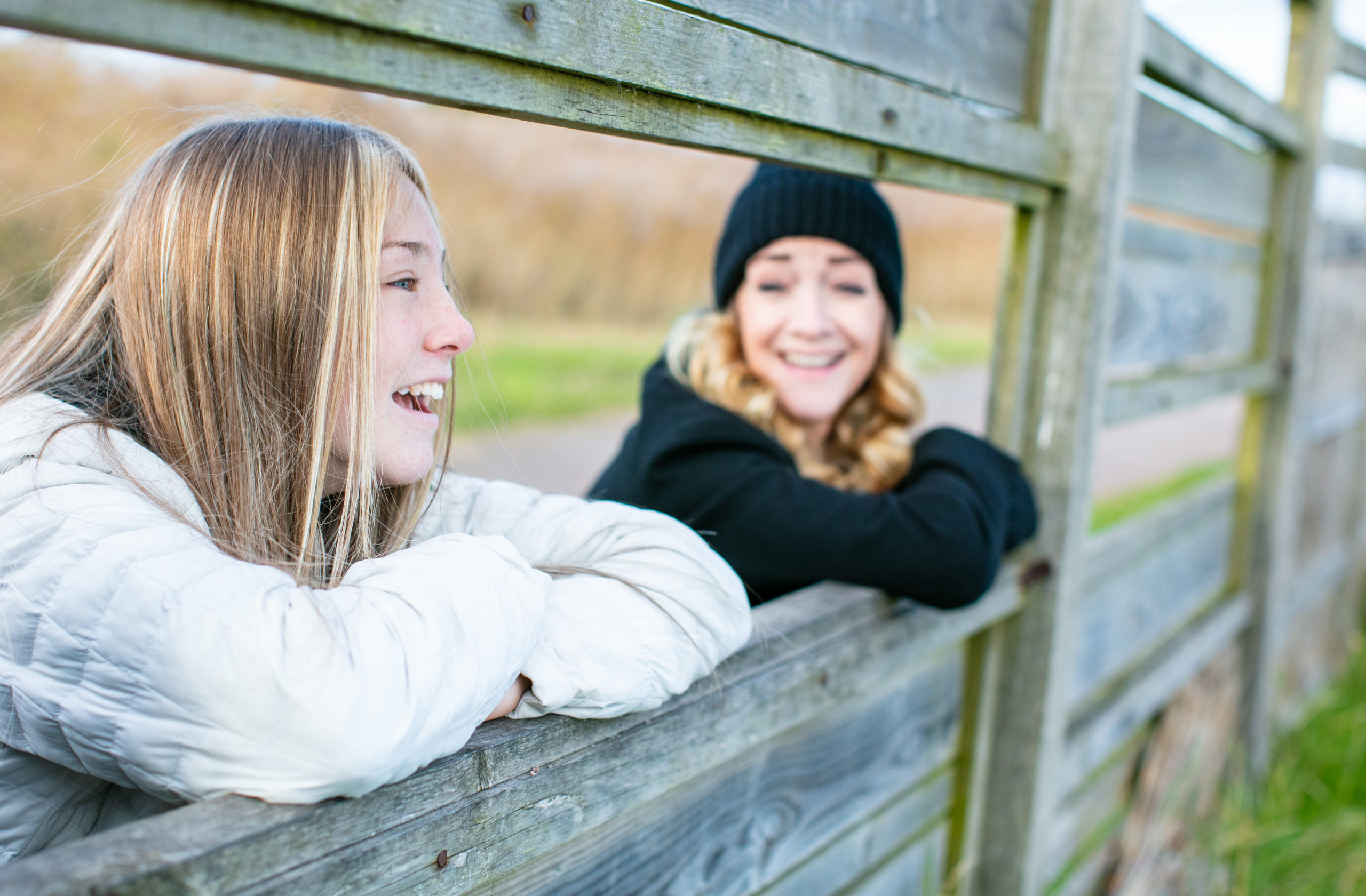 single female carer chatting to teenage girl