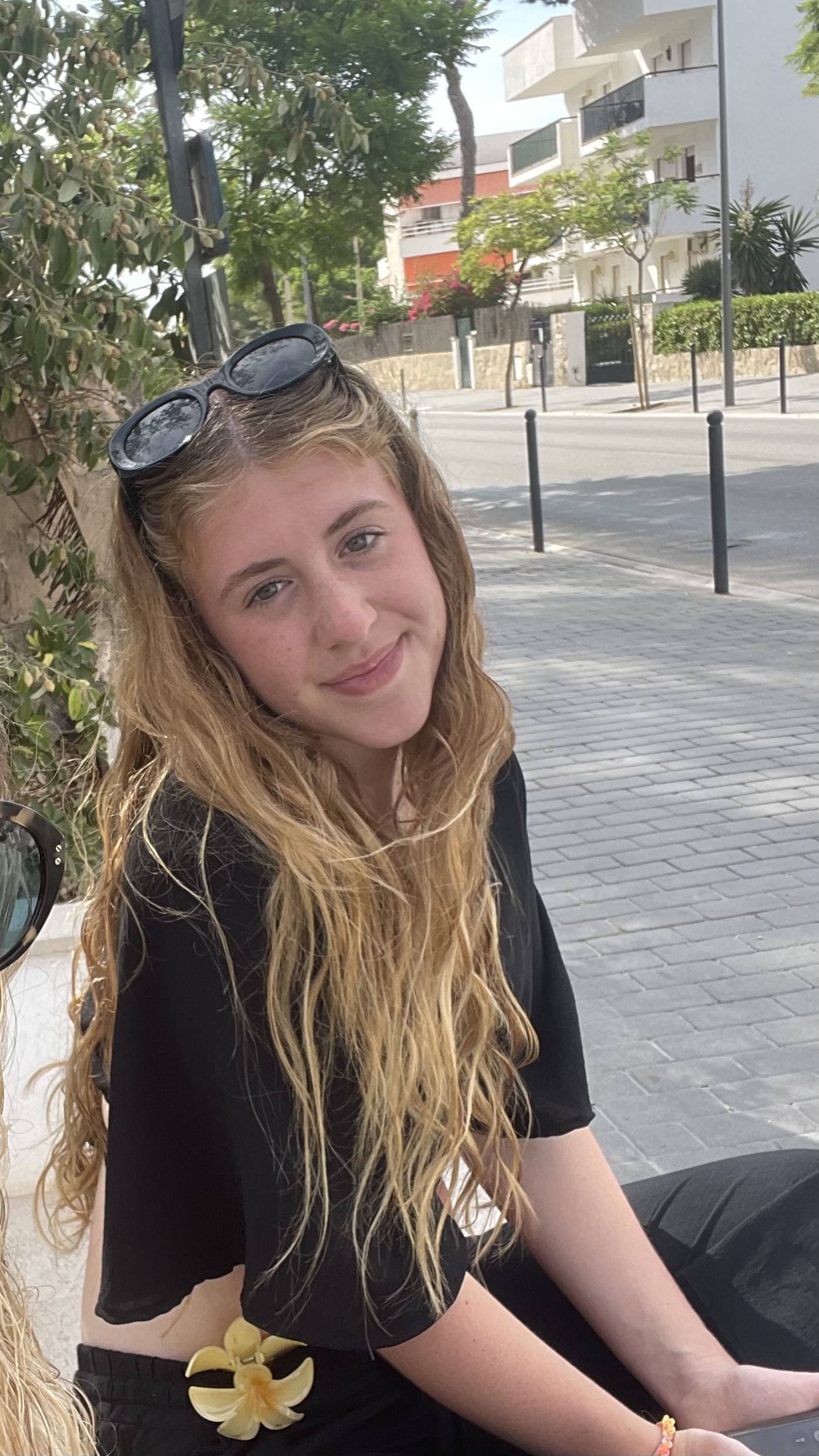 daughter-of-foster-carers-smiling-on-bench