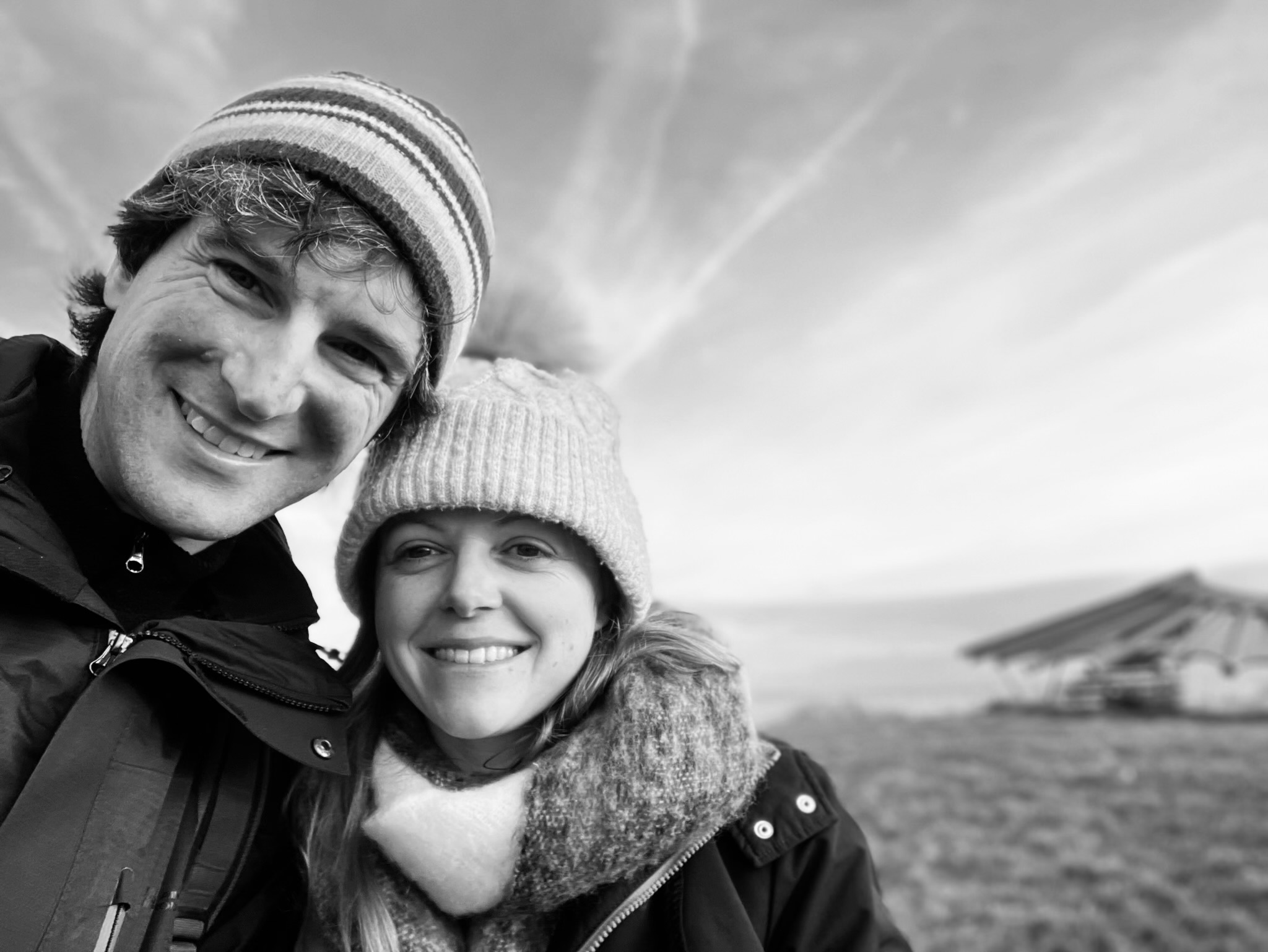 husband-and-wife-on-the-beach-smiling